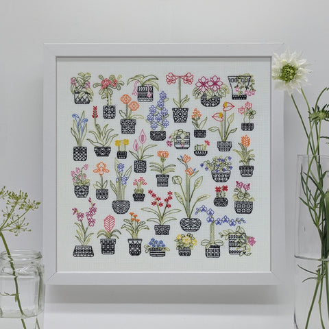 Blackwork embroidery flowering plants design