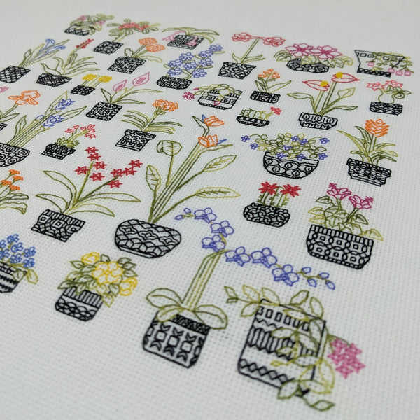Blackwork embroidery plants in pots with flowers